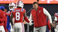 New England Patriots wide receiver Stefon Diggs (8) and New England Patriots head coach Mike Vrabel high-five prior to the game against the New York Giants at Gillette Stadium. Mandatory Credit: Eric Canha-Imagn Images