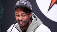New England Patriots wide receiver Stefon Diggs (8) speaks to media during Opening Night for Super Bowl LX at San Jose Convention Center.