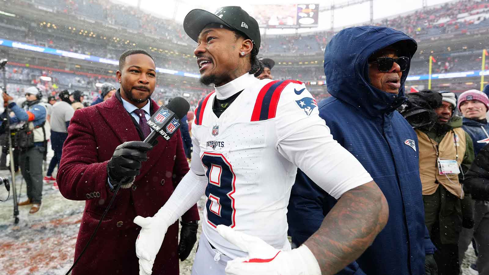New England Patriots wide receiver Stefon Diggs (8) speaks to the media after defeating the Denver Broncos in the 2026 AFC Championship Game at Empower Field at Mile High.
