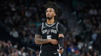 San Antonio Spurs guard Stephon Castle (5) looks on in the first half against the New York Knicks at Frost Bank Center.