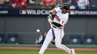 Cleveland Guardians outfielder Steven Kwan (38) hits a double in the eighth inning against the Detroit Tigers during game three of the Wildcard round for the 2025 MLB playoffs at Progressive Field.