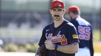 Atlanta Braves pitcher Spencer Strider (99) works out during spring training workouts
