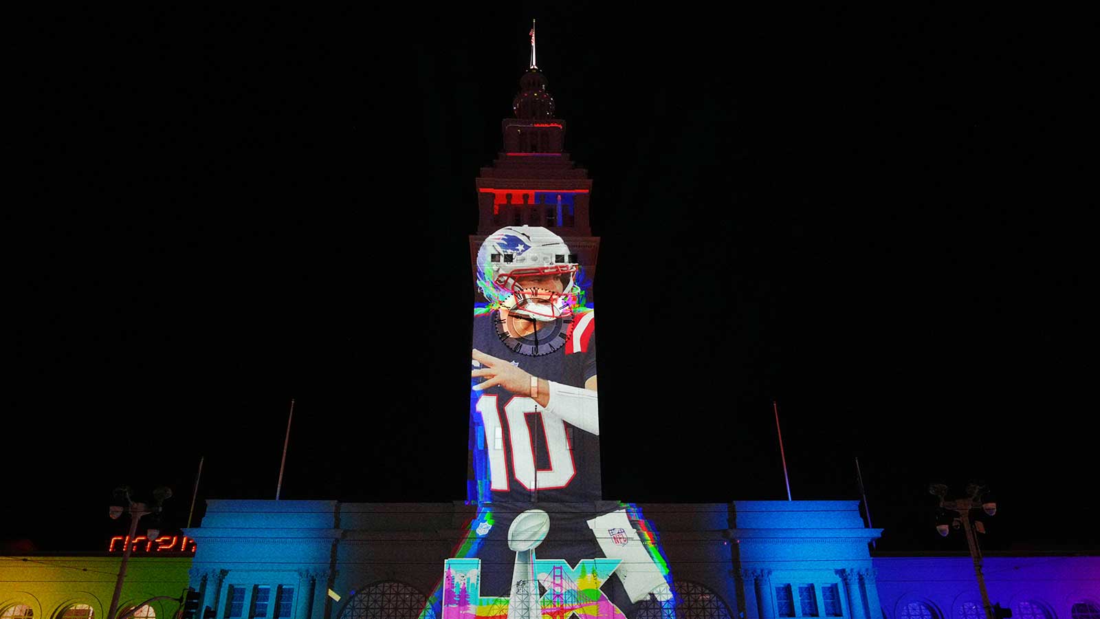 A image of New England Patriots quarterback Drake Maye (10) is projected on the Ferry Building. 