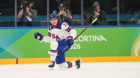 Tage Thompson (72) of the United States celebrates after scoring a goal during the first period against Slovakia in a men's ice hockey semifinal during the Milano Cortina 2026 Olympic Winter Games at Milano Santagiulia Ice Hockey Arena.