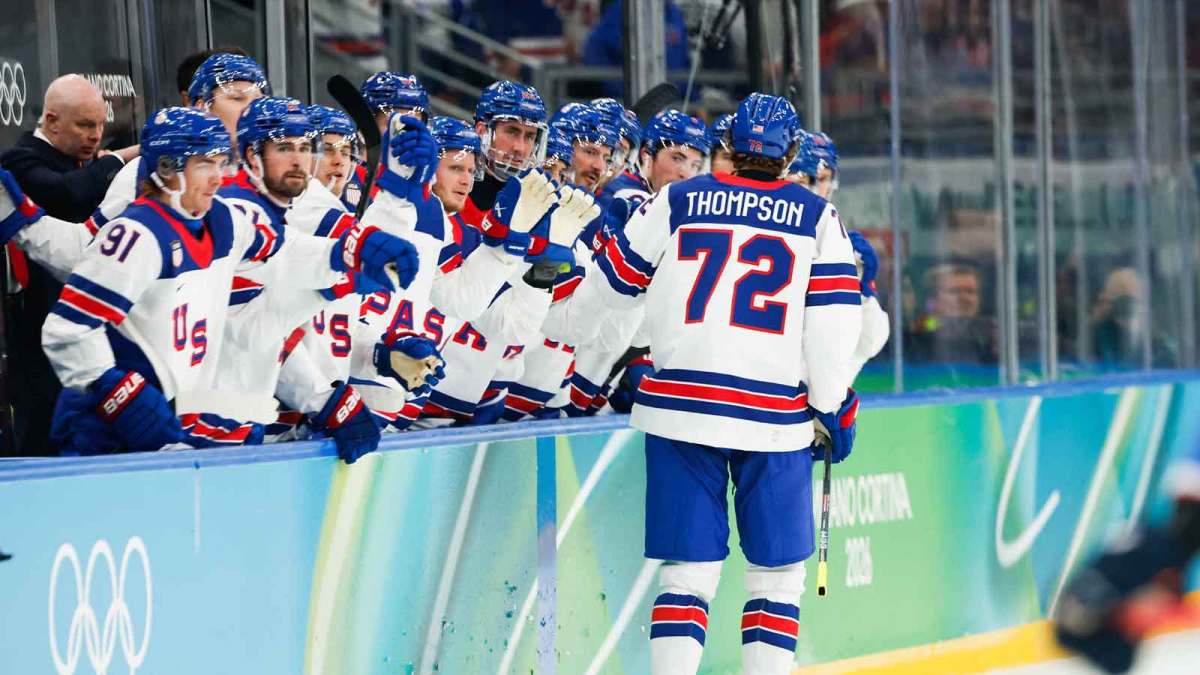 Tage Thompson (72) of the United States celebrates with the bench after scoring a goal during the first period against Slovakia in a men's ice hockey semifinal during the Milano Cortina 2026 Olympic Winter Games at Milano Santagiulia Ice Hockey Arena.