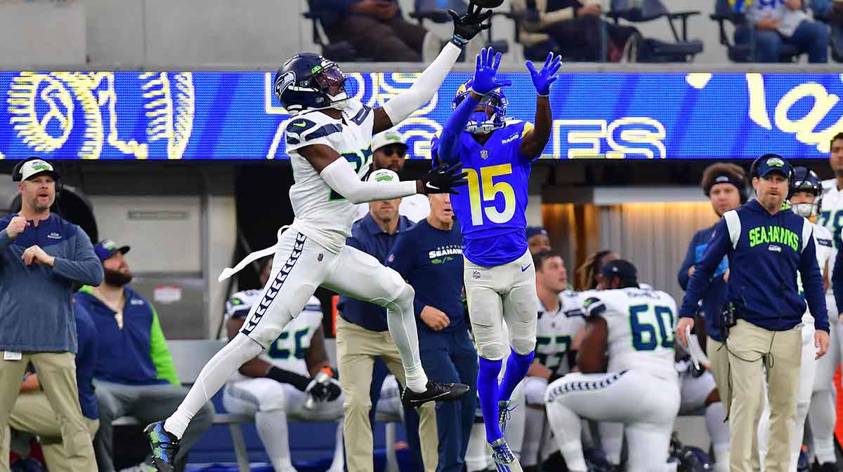 Seattle Seahawks cornerback Tariq Woolen (27) blocks a pass intended for Los Angeles Rams wide receiver Tutu Atwell (15) during the second half at SoFi Stadium. 