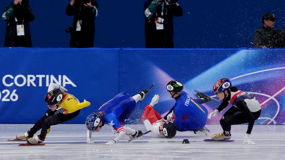 Santos-Griswold of the United States, Kamila Sellier of Poland and Arianna Fontana of Italy fall in the women's short track speed skating 1500m quarterfinals during the Milano Cortina 2026 Olympic Winter Games at Milano Ice Skating Arena