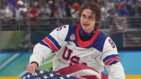 Jack Hughes (86) of the United States celebrates after scoring the game-winning goal to defeat Canada in the men's ice hockey gold medal game during the Milano Cortina 2026 Olympic Winter Games at Milano Santagiulia Ice Hockey Arena.