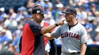 Cleveland Indians manager Terry Francona (77) gestures toward the dugout at starting pitcher Trevor Bauer (47) in the fifth inning against the Kansas City Royals at Kauffman Stadium.