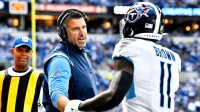 Tennessee Titans head coach Mike Vrabel congratulates wide receiver A.J. Brown (11) on his touchdown during the second quarter at Lucas Oil Stadium Sunday, Oct. 31, 2021 in Indianapolis, Ind. Titans Colts 063