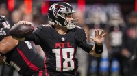 Atlanta Falcons quarterback Kirk Cousins (18) passes the ball against the New Orleans Saints during the second half at Mercedes-Benz Stadium.