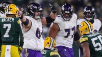 Baltimore Ravens center Tyler Linderbaum (64) reacts after a defensive penalty against the Green Bay Packers gives the Ravens a first down on Saturday, December 27, 2025, at Lambeau Field in Green Bay, Wis. The Ravens won the game, 41-24.
