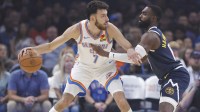 Thunder center/forward Chet Holmgren (7) drives to the basket against Denver Nuggets guard/forward Tim Hardaway Jr. (10) during the first quarter at Paycom Center