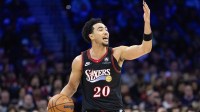 76ers guard Jared McCain (20) controls the ball against the Brooklyn Nets during the third quarter at Xfinity Mobile Arena with Thunder's Jaylin Williams in the background