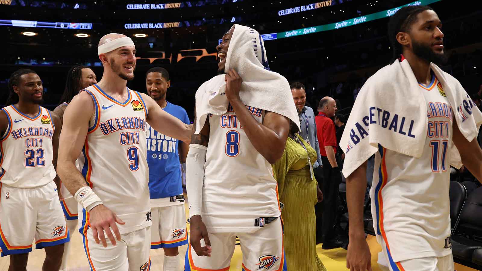Thunder guard Jalen Williams (8) celebrates with guard Alex Caruso (9) after defeating the Los Angeles Lakers 119-110 at Crypto.com Arena