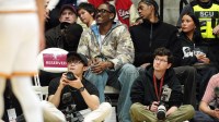 Thunder and former Santa Clara Broncos forward Jalen Williams (center) sits courtside during the second half against the Gonzaga Bulldogs at Leavey Center