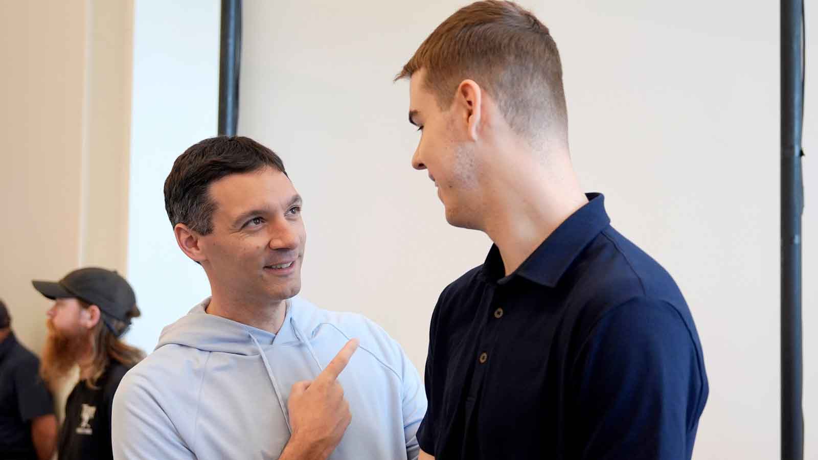 Thunder head coach Mark Daigneault talks with Nikola Topic during an introductory press conference for the 2024 Thunder draft picks at Oklahoma Contemporary Arts Center in Oklahoma City