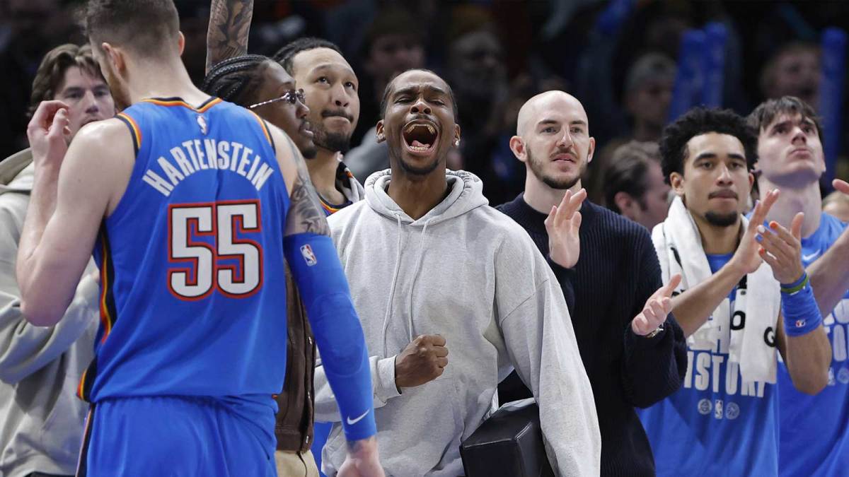 Thunder guard Shai Gilgeous-Alexander (2) screams as he watches his team play against the Cleveland Cavs during the second half at Paycom Center with Jalen Williams in the background