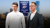 Thunder GM Sam Presti next to Thunder head coach Mark Daigneault with the Thunder's 2025 championship banner and the Oklahoma City skyline in the background