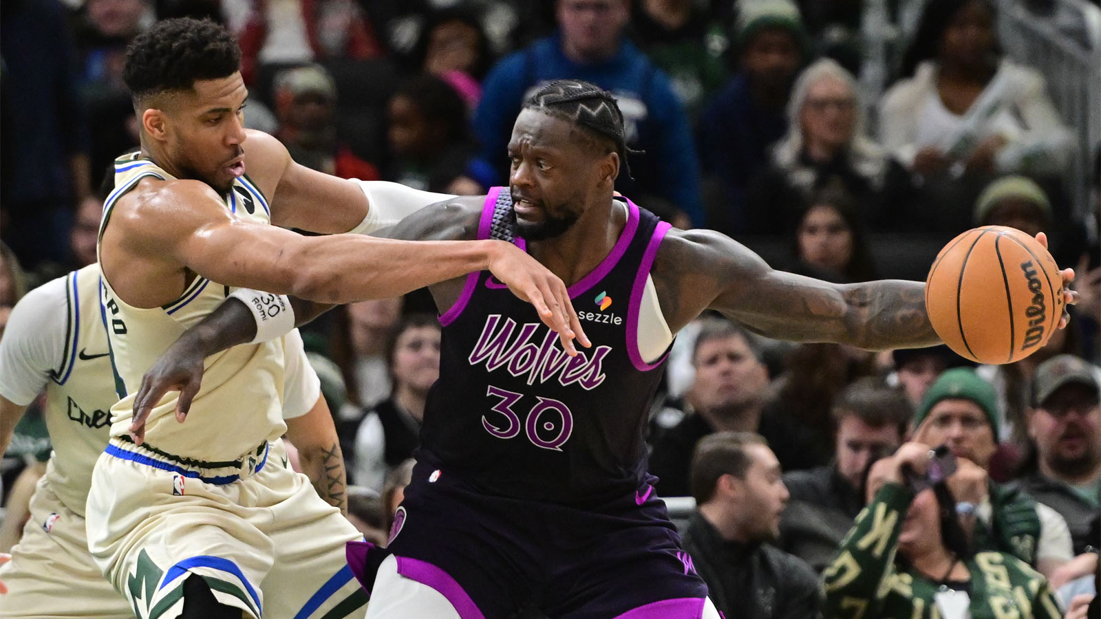 Timberwolves forward Julius Randle (30) looks for a shot against Milwaukee Bucks forward Giannis Antetokounmpo (34) in the fourth quarter at Fiserv Forum