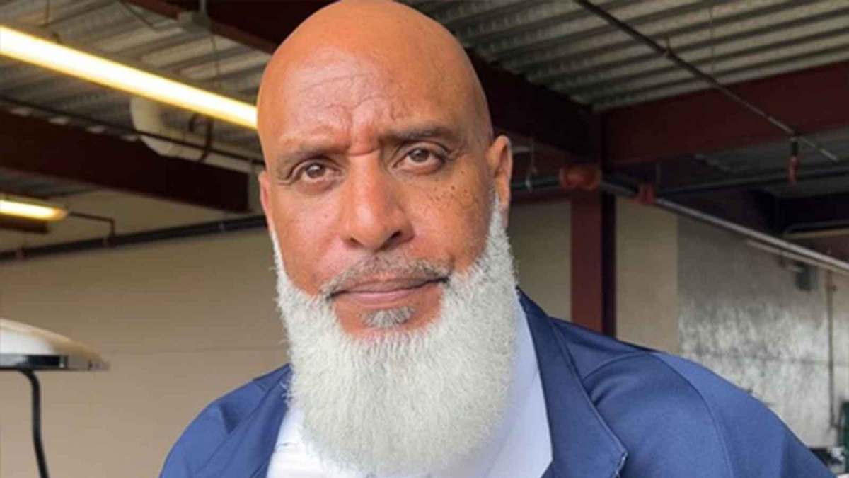 Major League Baseball Players Association executive director Tony Clark speaks to reporters.