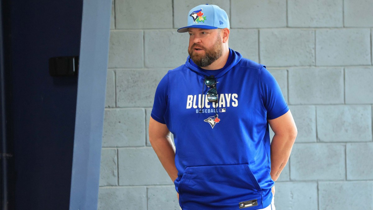 Toronto Blue Jays manager John Schneider (14) looks on for spring training practice at Blue Jays Player Development Complex. Mandatory Credit: Kim Klement Neitzel-Imagn Images