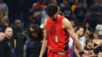 Portland Trail Blazers forward Deni Avdija (8) heads to the locker room after suffering an injury against the Phoenix Suns in the first half at Mortgage Matchup Center.