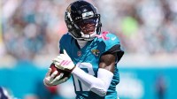 Jacksonville Jaguars wide receiver Travis Hunter (12) runs the ball during the first half against the Seattle Seahawks at EverBank Stadium.