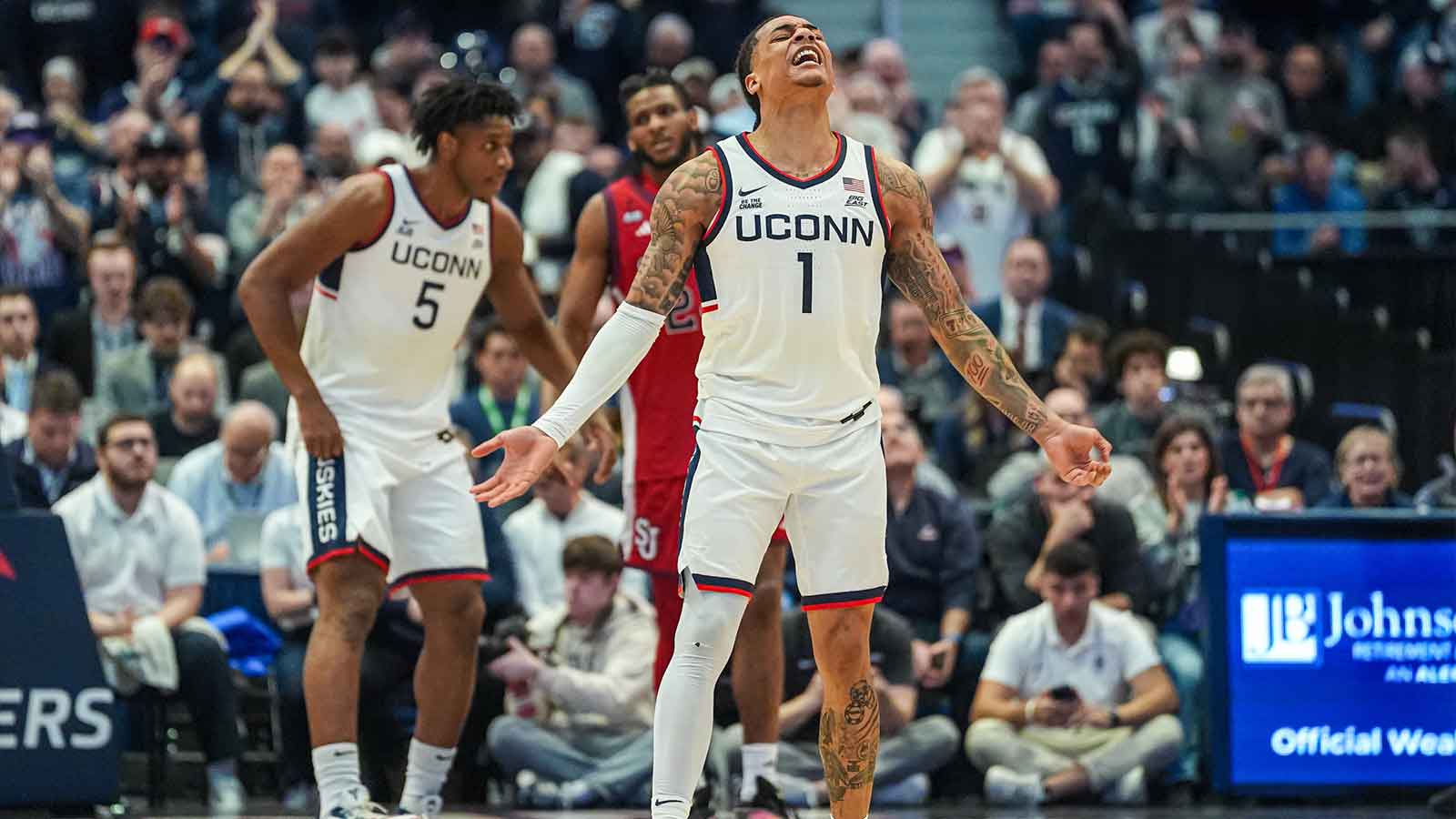 UConn Huskies guard Solo Ball (1) reacts to the crowd after a play against the St. John's Red Storm in the first half at PeoplesBank Arena.
