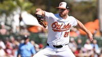 Baltimore Orioles starting pitcher Trevor Rogers (28) throws a pitch in the first inning against the New York Yankees during spring training at Ed Smith Stadium.