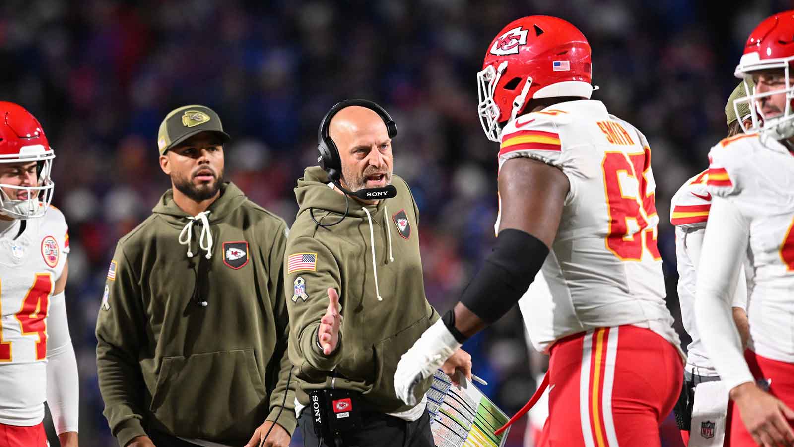 Kansas City Chiefs offensive coordinator Matt Nagy greets guard Trey Smith (65) in the second half against the Buffalo Bills at Highmark Stadium.