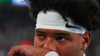 Ole Miss quarterback Trinidad Chambliss (6) cries after losing the CFP Fiesta Bowl against Miami at the State Farm Stadium, in Glendale, Ariz., on Thursday, Jan. 8, 2026.