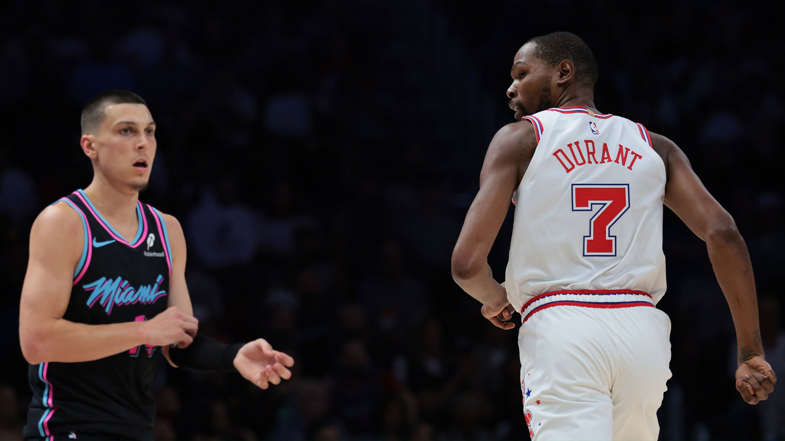 Houston Rockets forward Kevin Durant (7) stares at Miami Heat guard Tyler Herro (14) during the second quarter at Kaseya Center. 