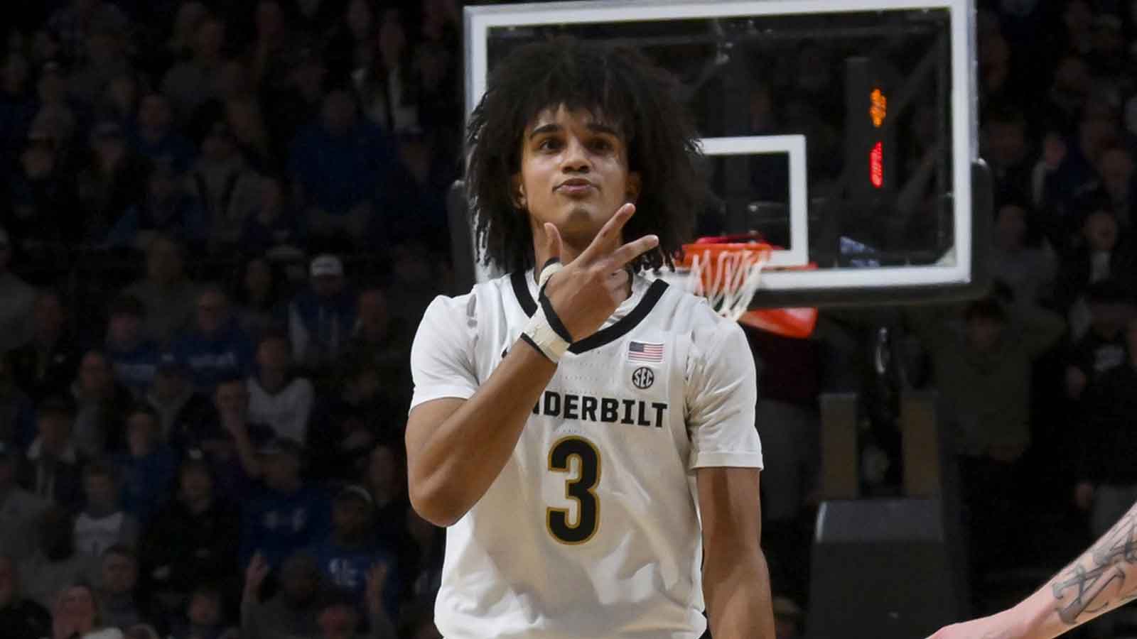 Vanderbilt Commodores guard Tyler Tanner (3) reacts after a made three point basket against the Kentucky Wildcats during the second half at Memorial Gymnasium.