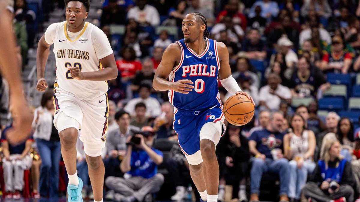 Philadelphia 76ers guard Tyrese Maxey (0) brings the ball up court against New Orleans Pelicans center Derik Queen (22) during the first half at Smoothie King Center.