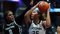 UConn Huskies forward Ice Brady (25) shoots the ball against Georgetown Hoyas guard Jaeda Wilson (0) in the second half.