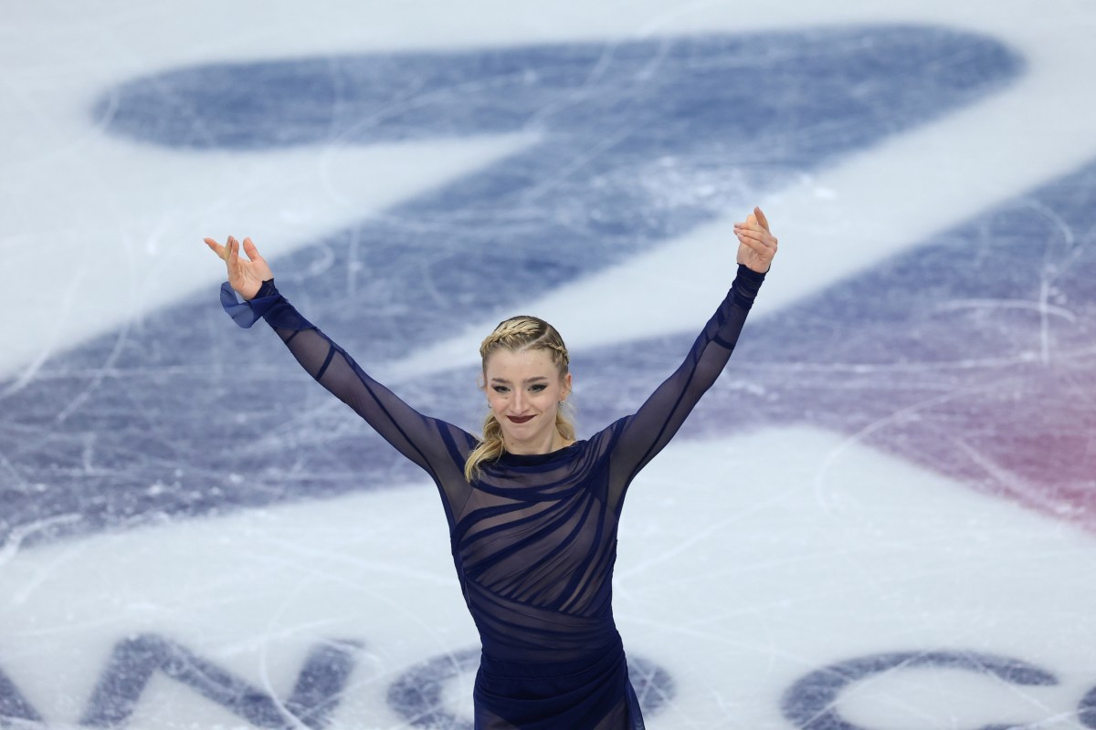 Amber Glenn of the United States reacts after competing in the women's free skate during the Milano Cortina 2026 Olympic Winter Games at Milano Ice Skating Arena.
