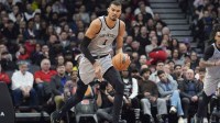 San Antonio Spurs center Victor Wembanyama (1) dribbles up court against the Toronto Raptors during the first half at Scotiabank Arena.