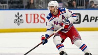 New York Rangers center Vincent Trocheck (16) skates with the puck against the New York Islanders during the third period at UBS Arena.