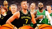 Kristaps Porzingis with Warriors' Steve Kerr, Al Horford, and Brandin Podziemski looking confused as Jaylen Brown and the Celtics celebrate opposite of them.