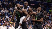 Golden State Warriors forward Draymond Green (23) fouls New Orleans Pelicans forward Herbert Jones (2) and center DeAndre Jordan (6) on a free throw attempt during the second half at Smoothie King Center.