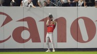 Boston Red Sox left fielder Jarren Duran (16) catches a fly ball hit by New York Yankees left fielder Cody Bellinger (35) (not pictured) during the seventh inning at Yankee Stadium.