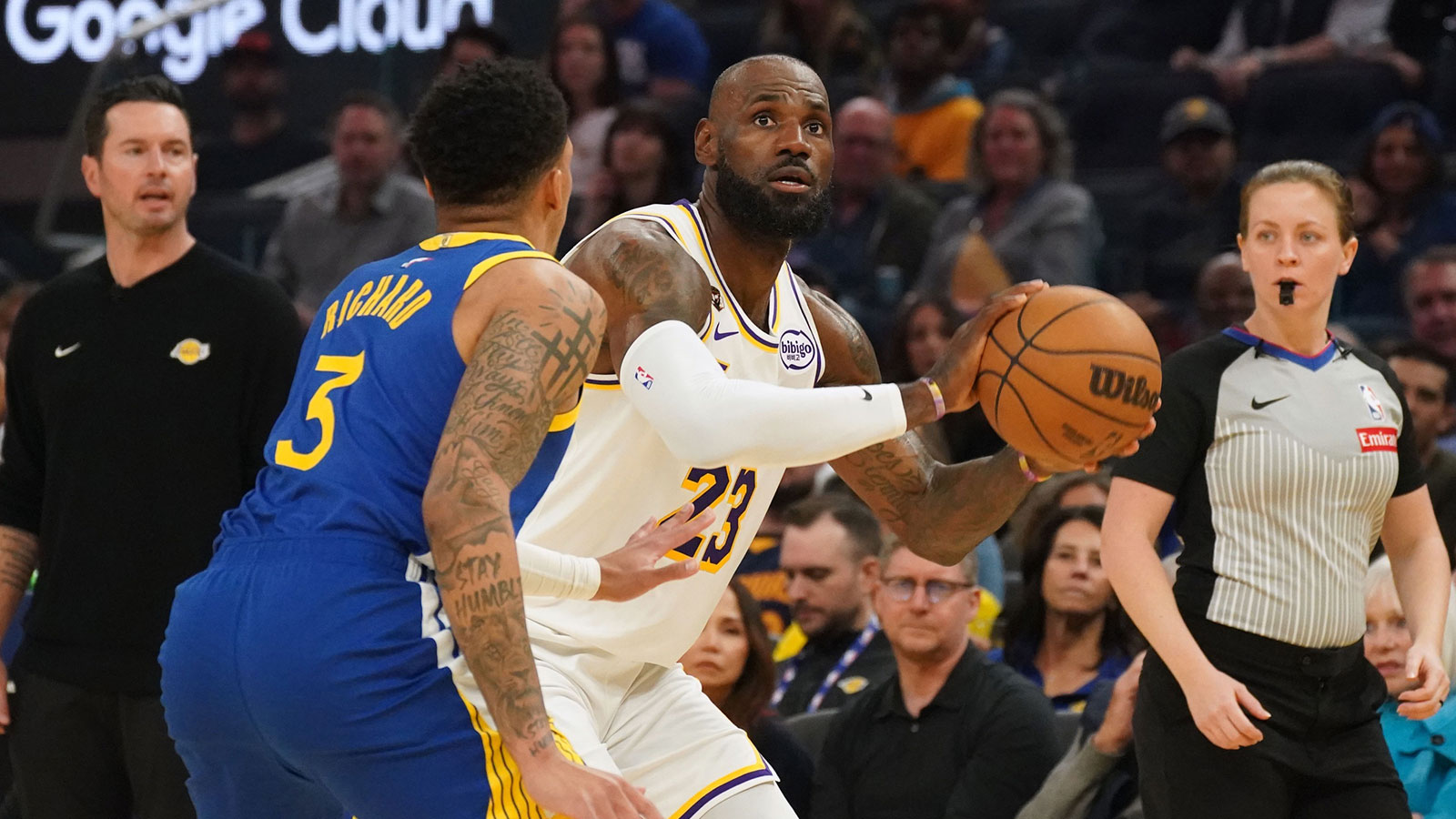 Los Angeles Lakers forward LeBron James (23) is defended by Golden State Warriors guard Will Richard (3) in the first period at Chase Center.