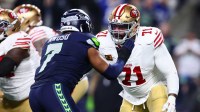 San Francisco 49ers offensive tackle Trent Williams (71) blocks Seattle Seahawks linebacker Uchenna Nwosu (7) during the first half in an NFC Divisional Round game at Lumen Field.