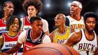 Tre Johnson, Bub Carrington, Alex Sarr, and Kyshawn George smile next to Kareem-Abdul Jabbar, Oscar Robertson and Vince Carter