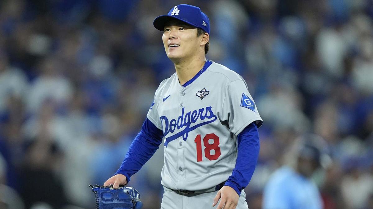 Los Angeles Dodgers pitcher Yoshinobu Yamamoto (18) reacts in the sixth inning against the Toronto Blue Jays during game six of the 2025 MLB World Series at Rogers Centre.