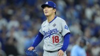 Los Angeles Dodgers pitcher Yoshinobu Yamamoto (18) reacts in the sixth inning against the Toronto Blue Jays during game six of the 2025 MLB World Series at Rogers Centre.