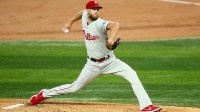 Philadelphia Phillies starting pitcher Zack Wheeler (45) throws during the third inning against the Texas Rangers at Globe Life Field.