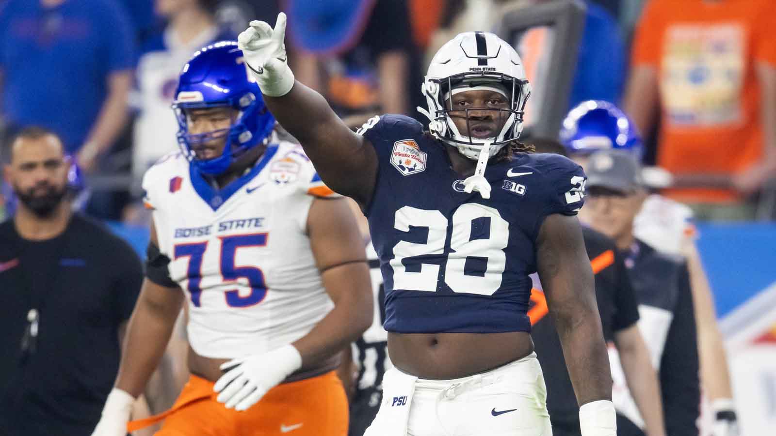 Penn State Nittany Lions defensive tackle Zane Durant (28) celebrates a play against the Boise State Broncos during the Fiesta Bowl at State Farm Stadium.