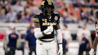 Missouri Tigers defensive end Zion Young (9) looks on before a play against the Virginia Cavaliers in the first half at EverBank Stadium.